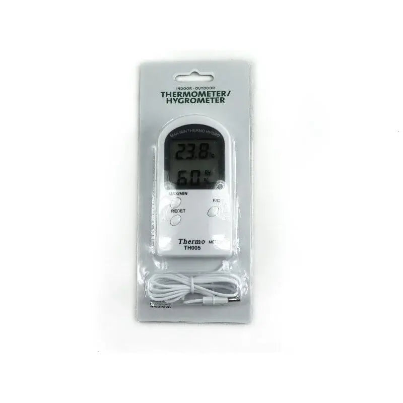 Digital hygro-thermometer on white background.