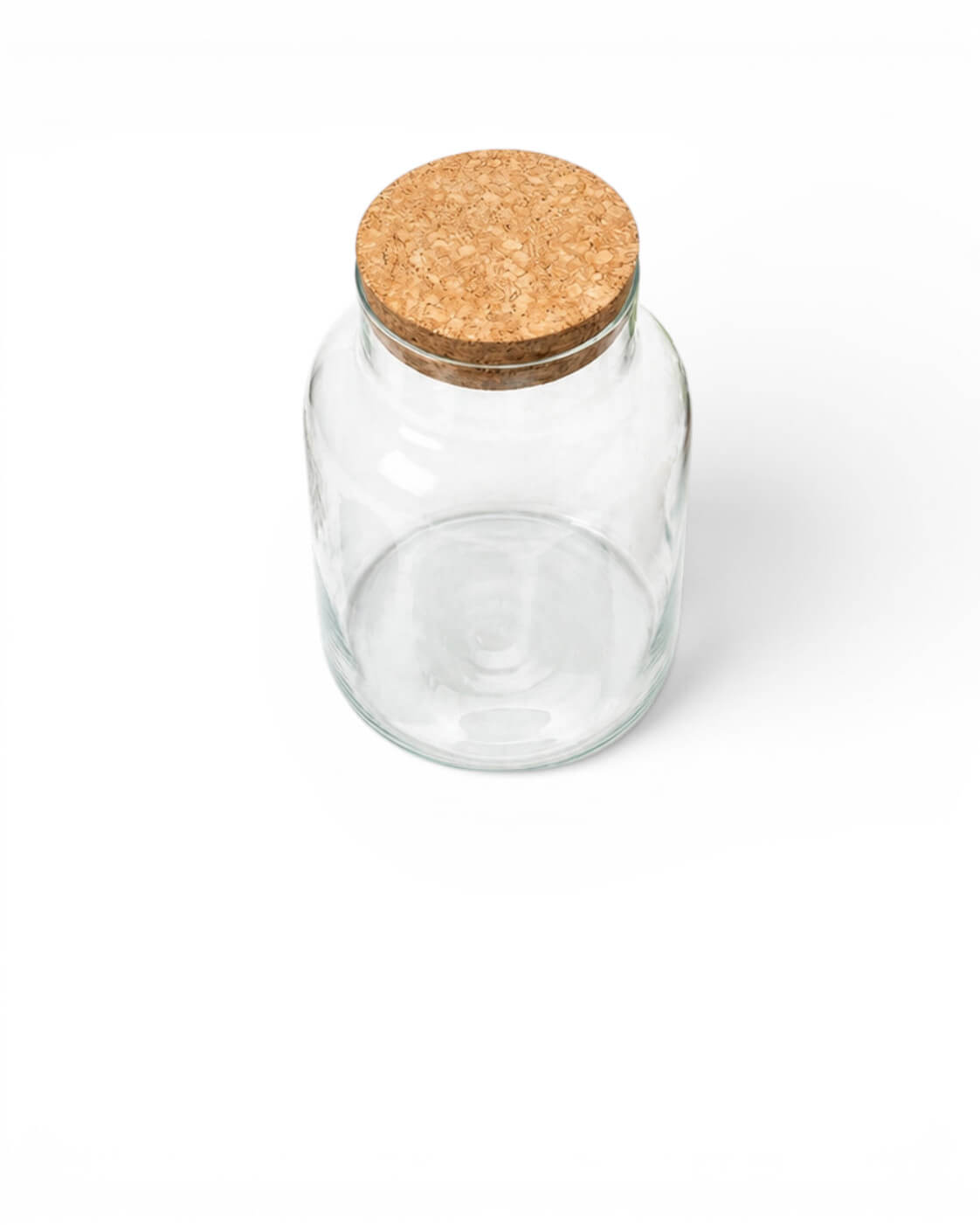 Clear glass jar with a cork lid on a white background
