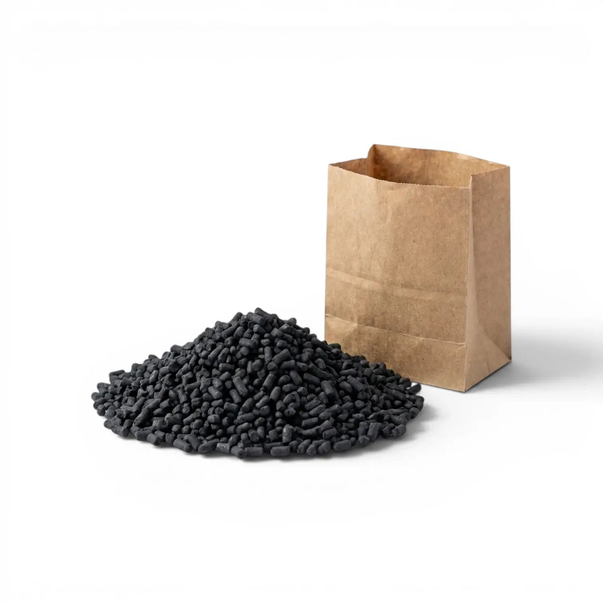 Black activated carbon pellets and a brown paper bag on a white background