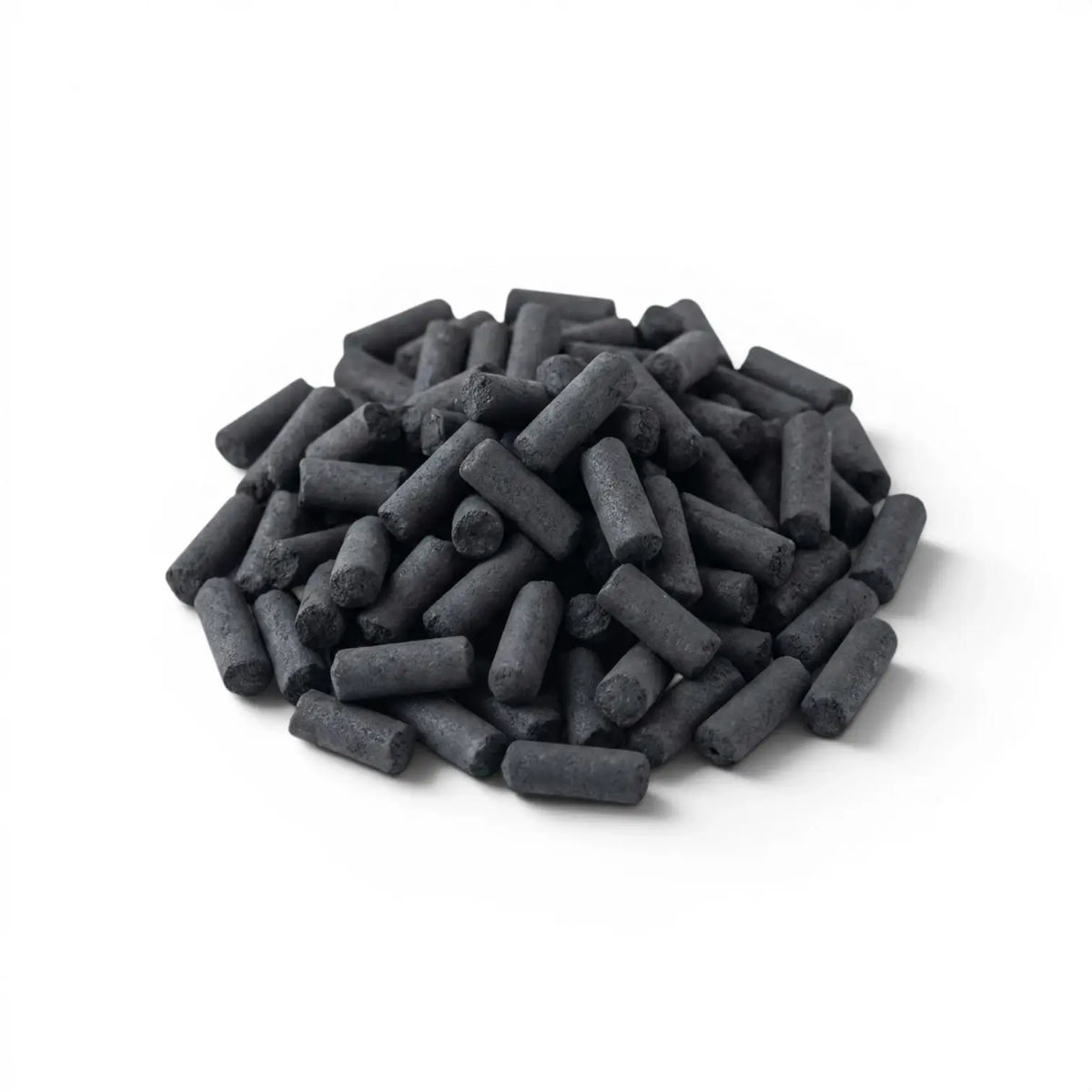 Pile of black cylindrical activated carbon pellets on a white background