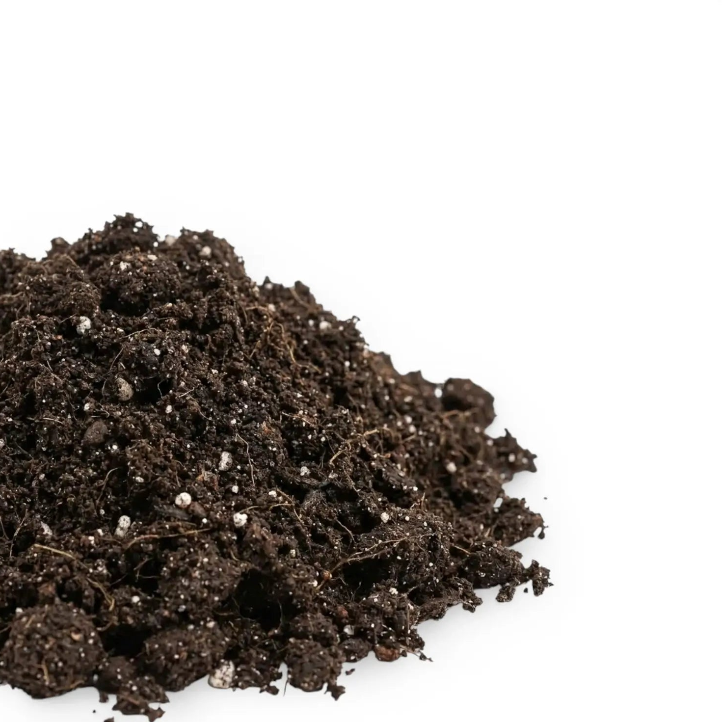 Heap of base potting mix on a white background