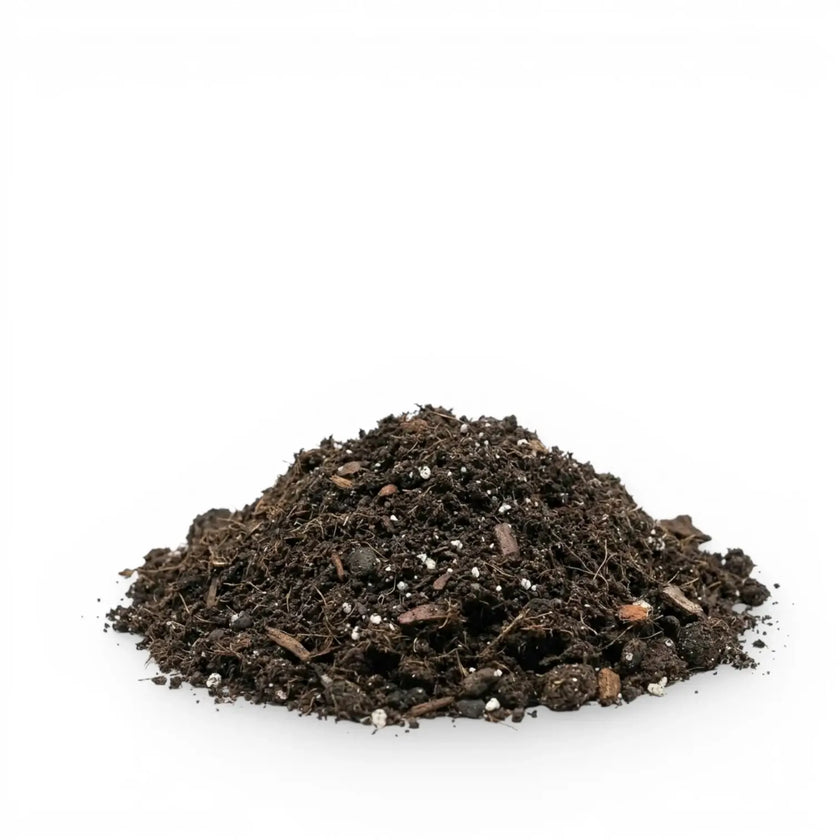 Heap of base potting mix on a white background