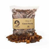 Coconut husk chips on white background.