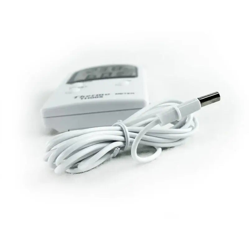Digital hygro-thermometer on white background.
