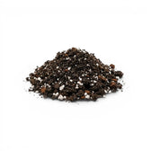 Heap of Fern potting mix on a white background