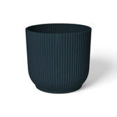 Planter 'vibes fold round' on white background.