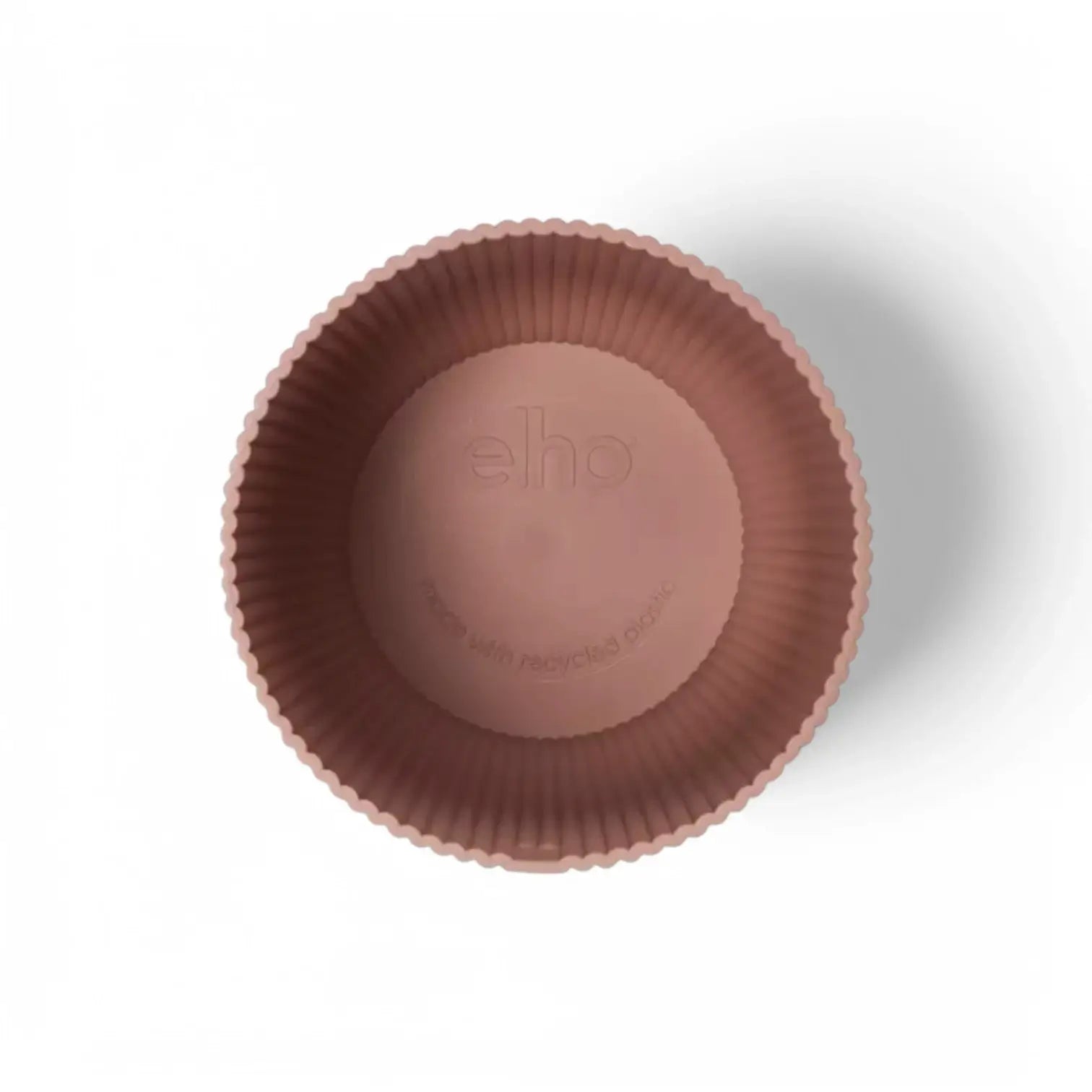 Planter 'vibes fold round' on white background.