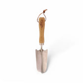 Stainless steel shovel main product photo on white background.