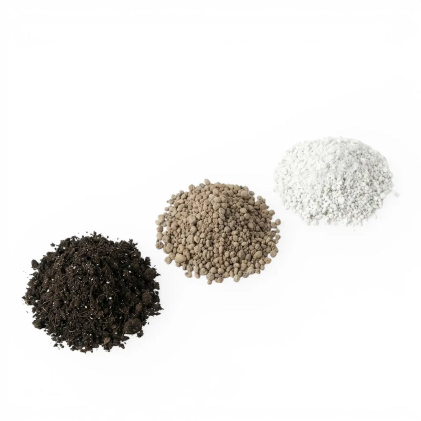 Three piles of of succulent substrate set ingredients on a white background
