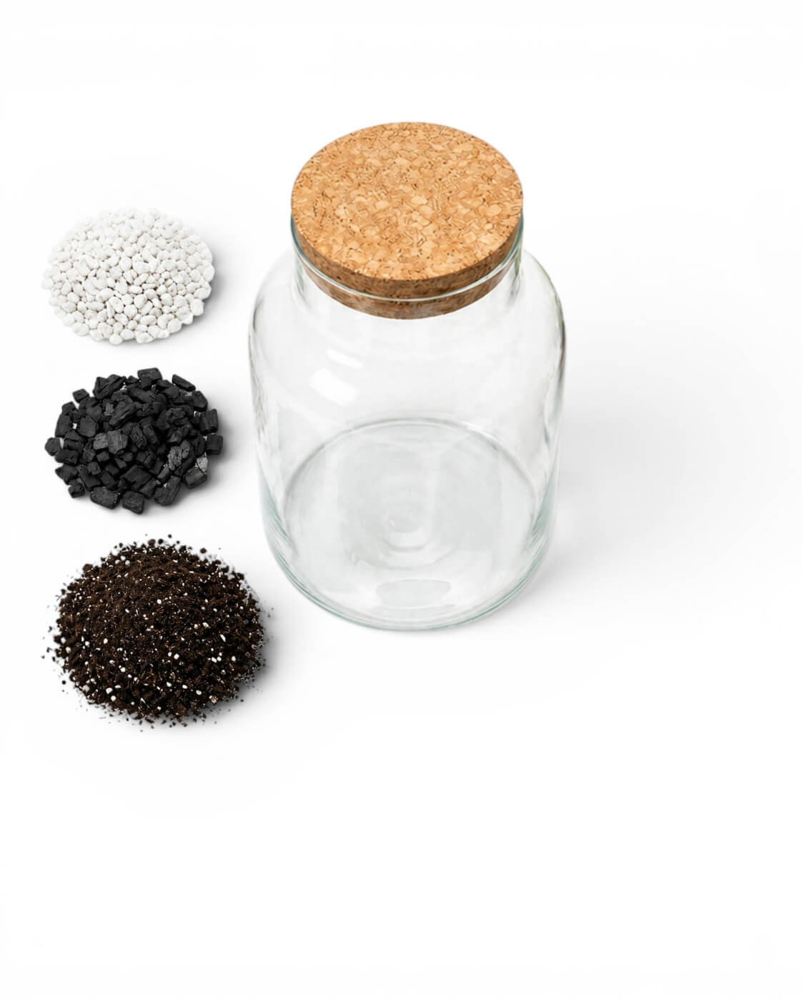 Clear glass jar with cork lid surrounded by small piles of substrates, gravel, activated carbon and soil on a white background