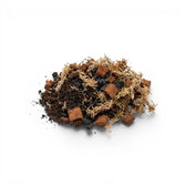 Heap of terrarium potting mix on a white background