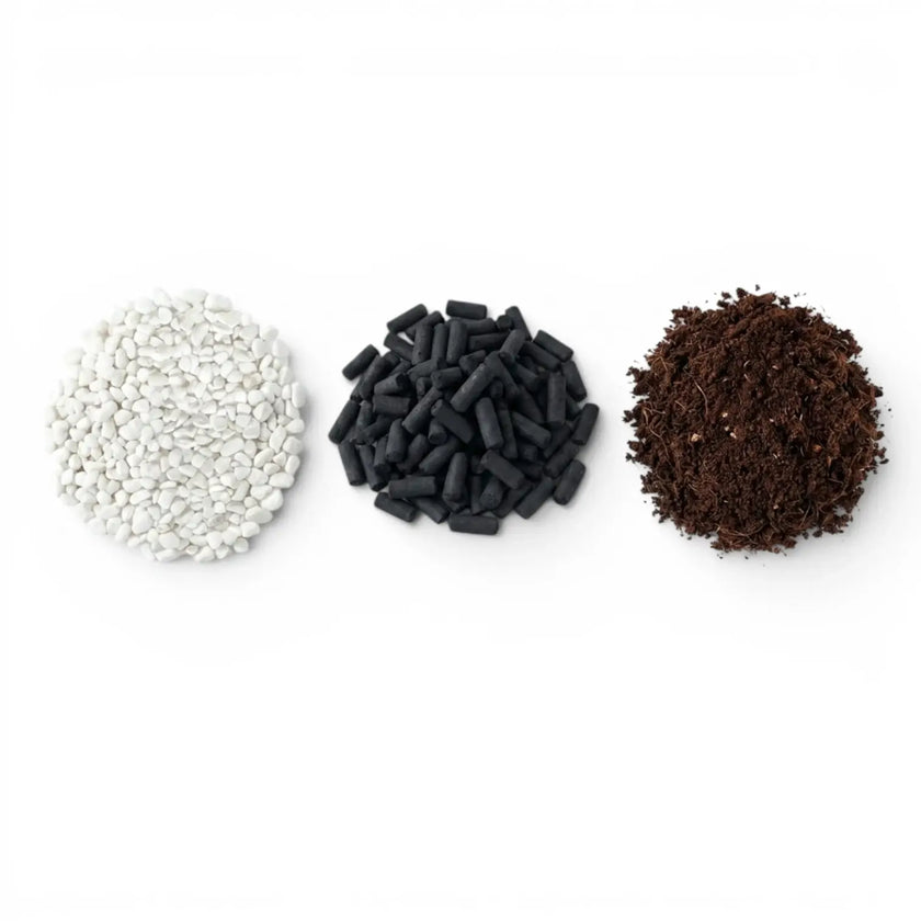 Three different terarrium substrate layers - activated carbon pellets, white gravel stones and coconut coir soil on a white background