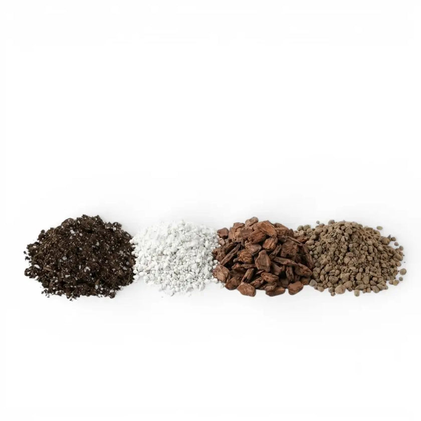 Universal sol mix ingredients: soil, perlite, pine bark and lava granules on white backround