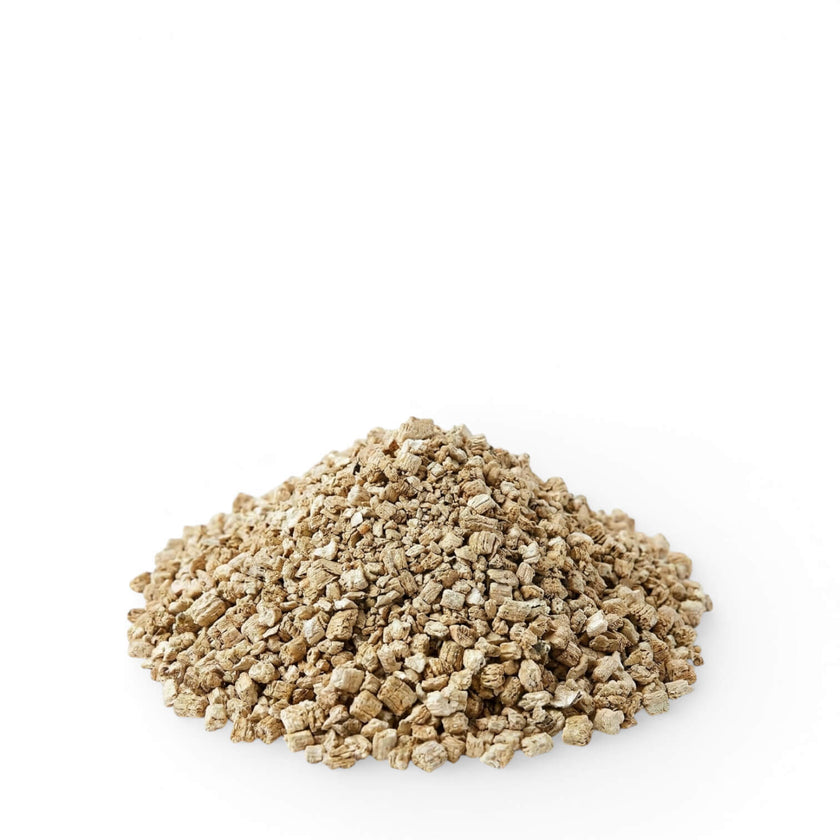 Heap of vermiculite on a white background