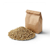 Brown paper bag with a pile of vermiculite on a white background